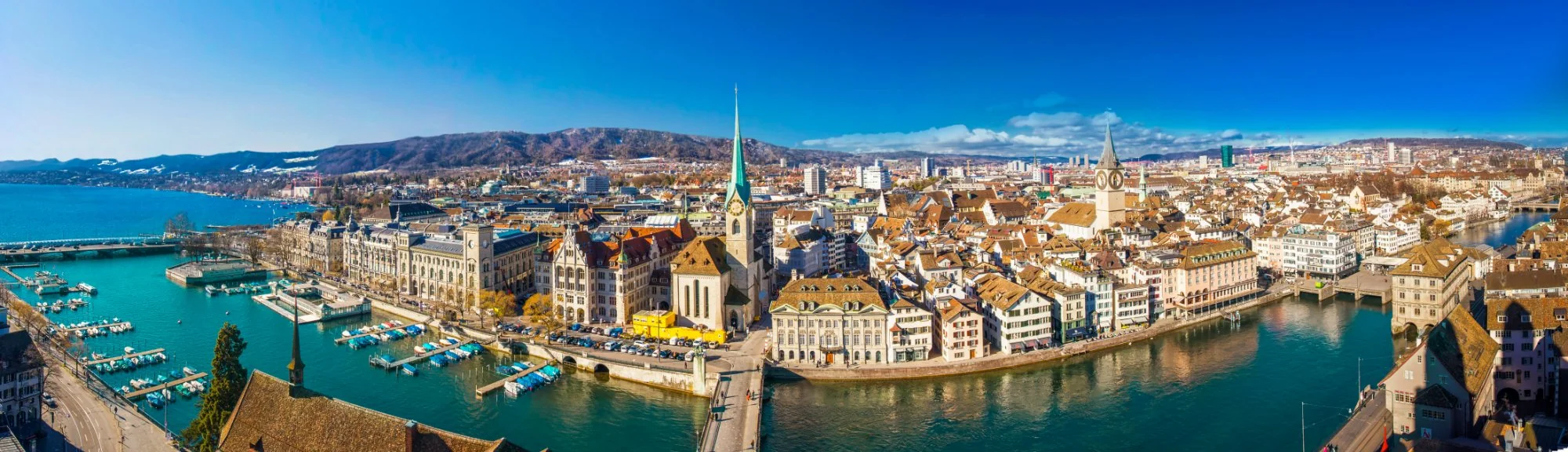 Zurich old town on the Limmat with the Fraumünster and St. Peter, Lake Zurich on the left